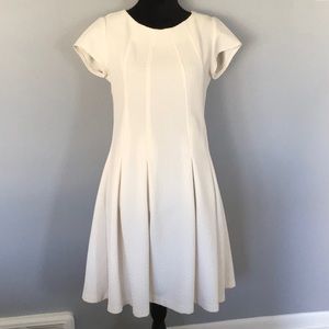 Taylor off white, fit/flair, pleated, cap sleeve